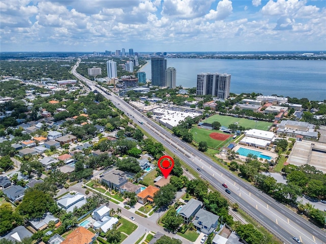 birds eye view of property featuring a water view