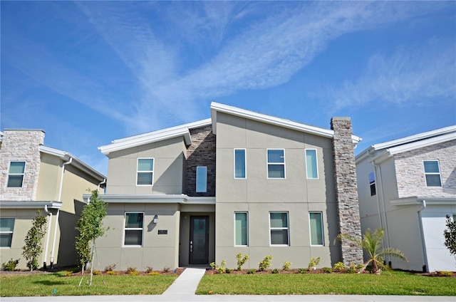 view of front facade with a front yard