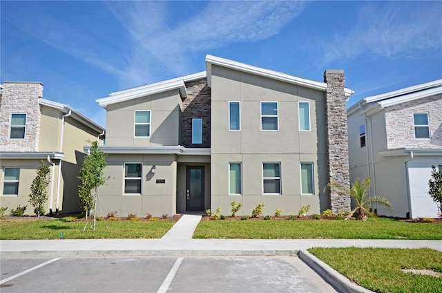 view of front of property with a front yard