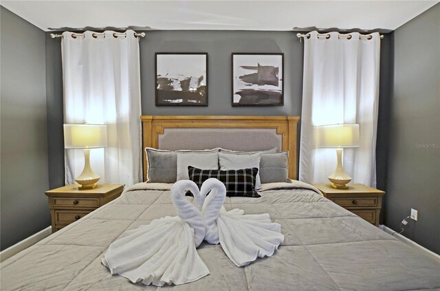 2857 Bookmark Dr, Kissimmee, FL 34746 - bedroom featuring baseboards