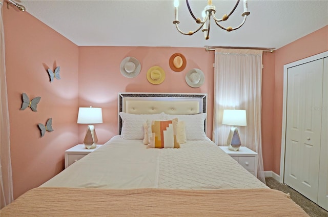 2857 Bookmark Dr, Kissimmee, FL 34746 - carpeted bedroom with a chandelier, a closet, and baseboards