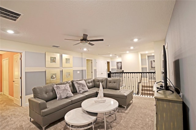 2857 Bookmark Dr, Kissimmee, FL 34746 - living room with ceiling fan, light colored carpet, visible vents, recessed lighting, and baseboards