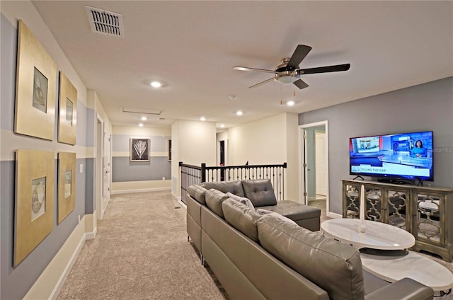 2857 Bookmark Dr, Kissimmee, FL 34746 - home theater with visible vents, baseboards, ceiling fan, recessed lighting, and light carpet
