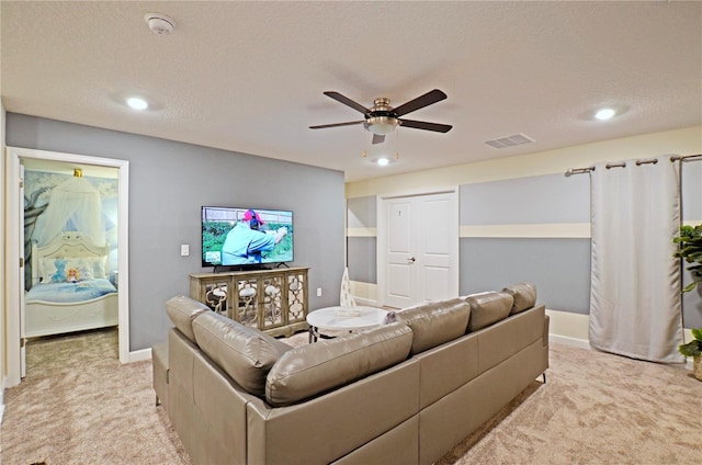 2857 Bookmark Dr, Kissimmee, FL 34746 - living area with visible vents, ceiling fan, light carpet, and baseboards