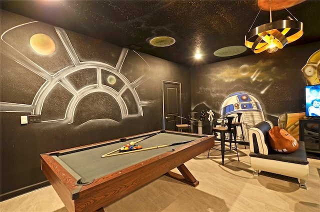 rec room featuring light tile patterned floors and billiards