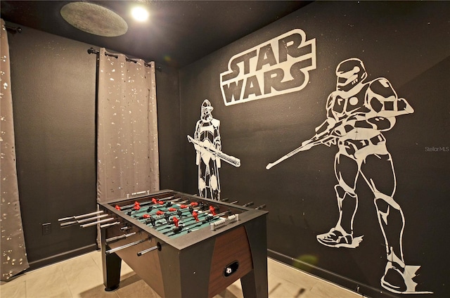 playroom featuring tile patterned floors