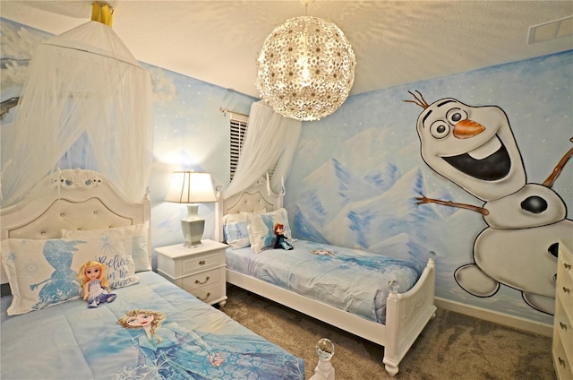 bedroom featuring an inviting chandelier, a textured ceiling, and dark carpet