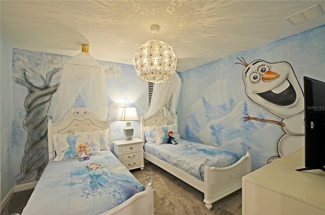 bedroom with an inviting chandelier, dark carpet, and a textured ceiling