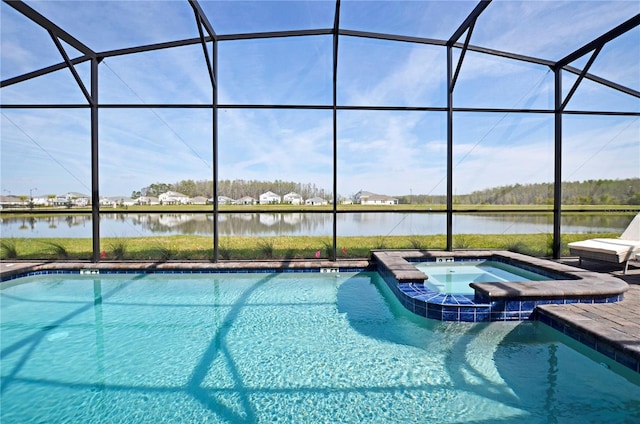 2857 Bookmark Dr, Kissimmee, FL 34746 - view of swimming pool with a water view, a pool with connected hot tub, a patio, and glass enclosure