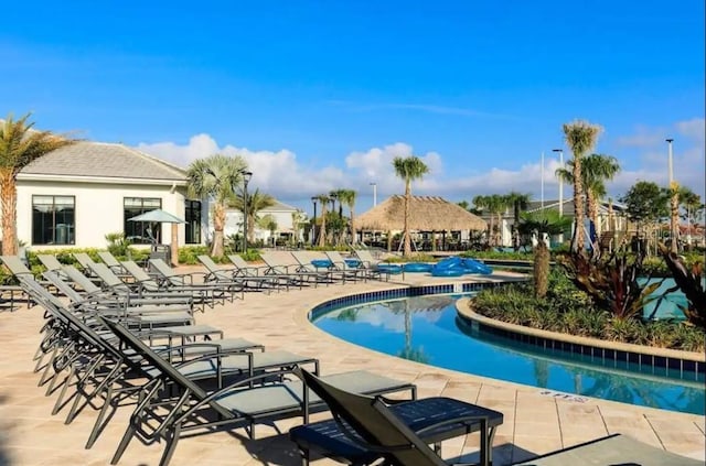 view of pool with a patio