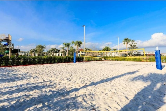 view of home's community featuring volleyball court