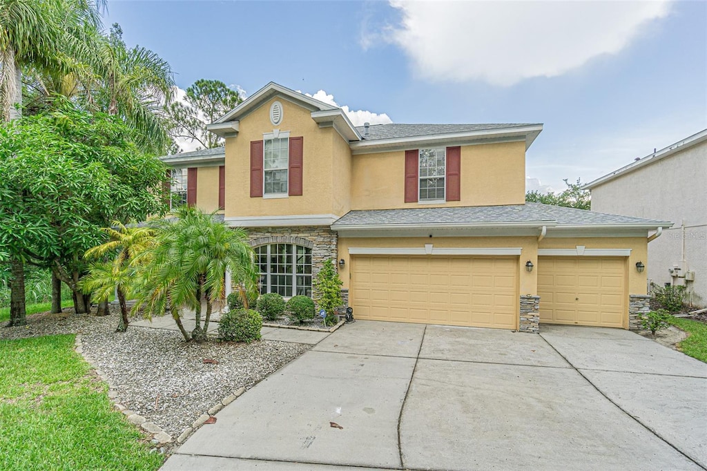 view of front of property featuring a garage