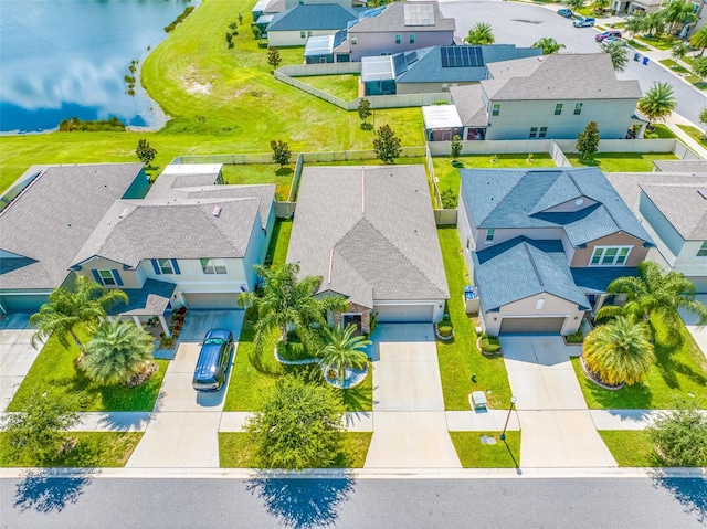 drone / aerial view featuring a water view