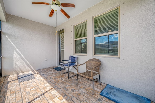 view of patio with ceiling fan