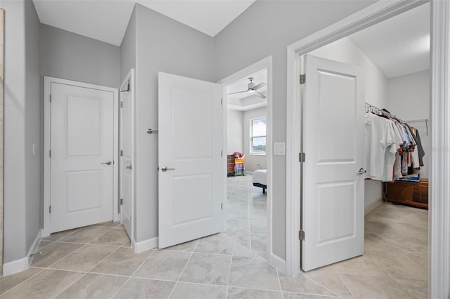 bedroom featuring light tile patterned floors