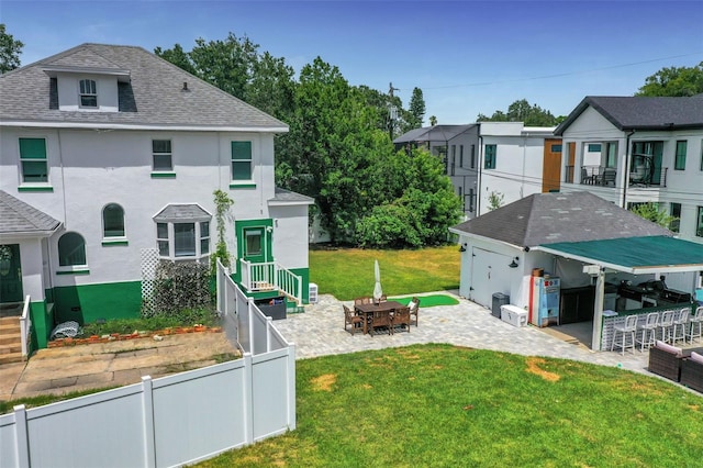 view of yard with a bar and a patio