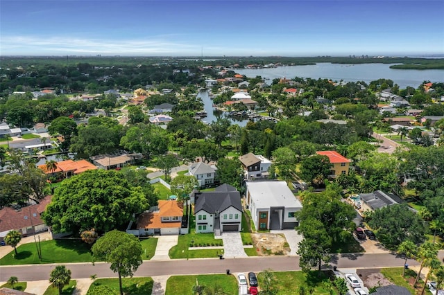 birds eye view of property featuring a water view