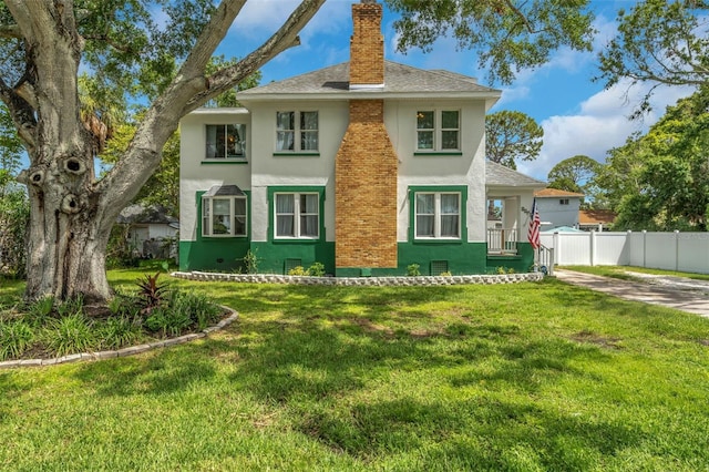 view of front of house with a front yard