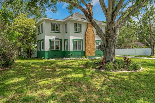 exterior space with a yard