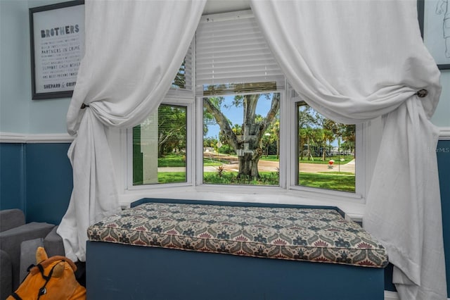 bedroom with multiple windows