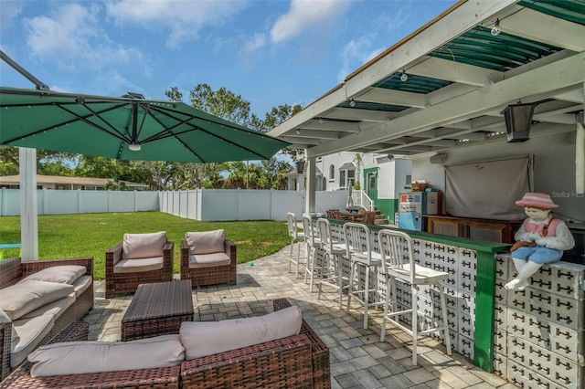 view of patio / terrace with an outdoor hangout area and exterior bar