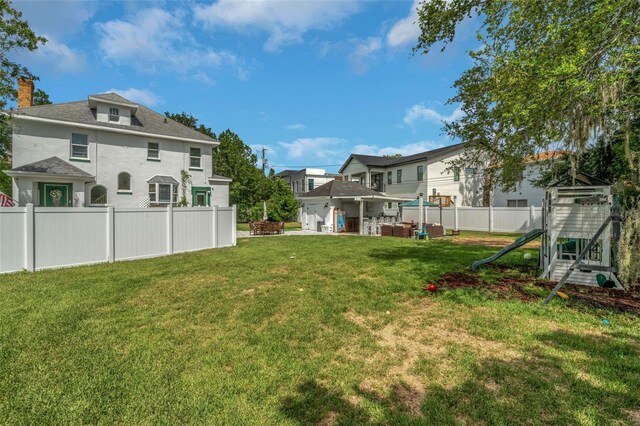 view of yard with a playground