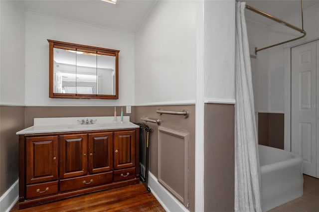 bathroom with vanity and crown molding