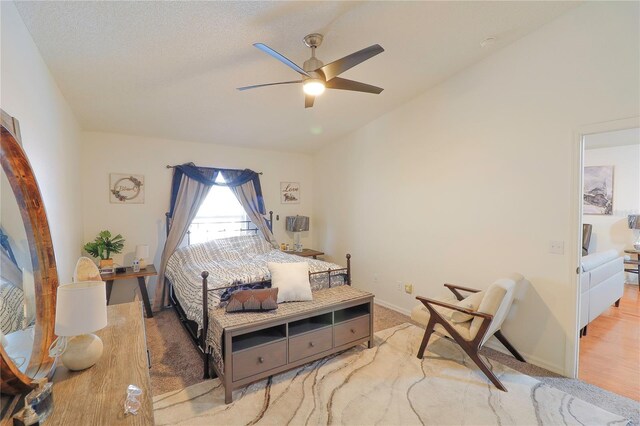 bedroom featuring wood-type flooring and ceiling fan