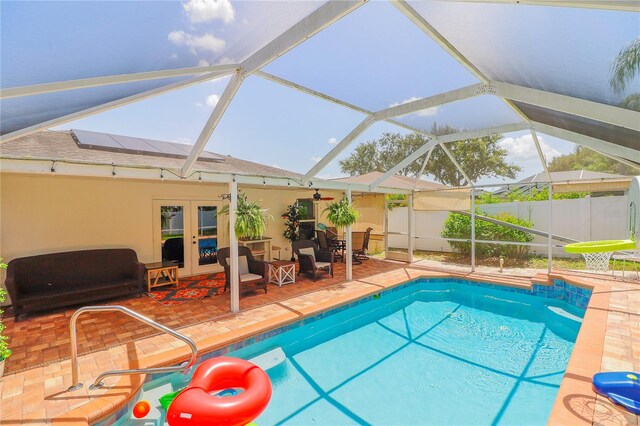 view of pool featuring a patio and a lanai