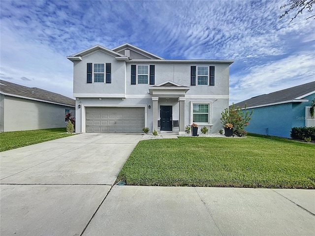 front facade with a garage and a front lawn