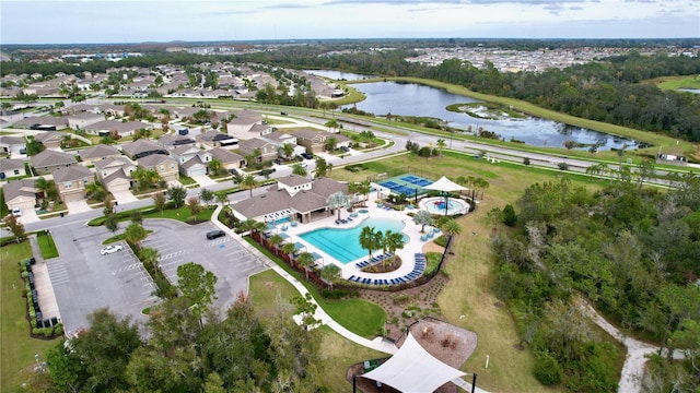 drone / aerial view with a water view