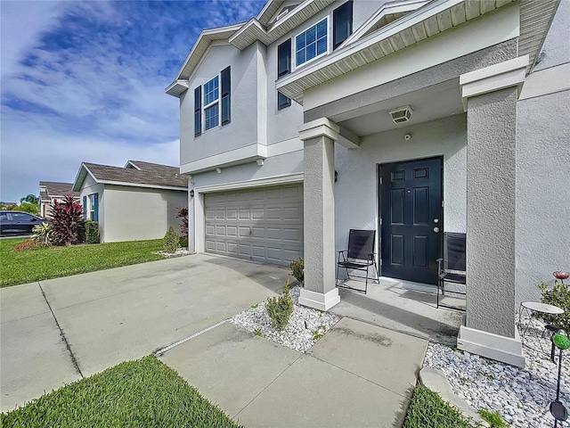 entrance to property featuring a garage