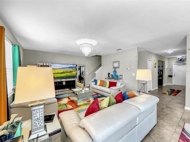 living room featuring a chandelier