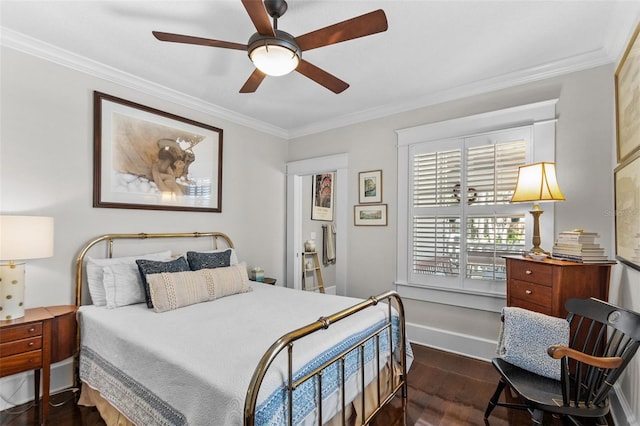 bedroom featuring crown molding, dark hardwood / wood-style floors, and ceiling fan