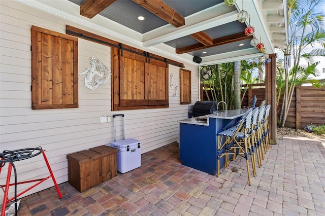 view of patio / terrace featuring grilling area and exterior bar