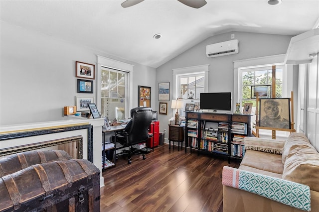 office space with ceiling fan, dark hardwood / wood-style floors, vaulted ceiling, and a wall unit AC