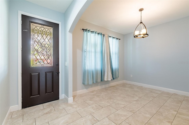 entryway featuring light tile patterned floors