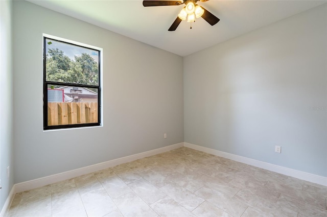 unfurnished room featuring ceiling fan