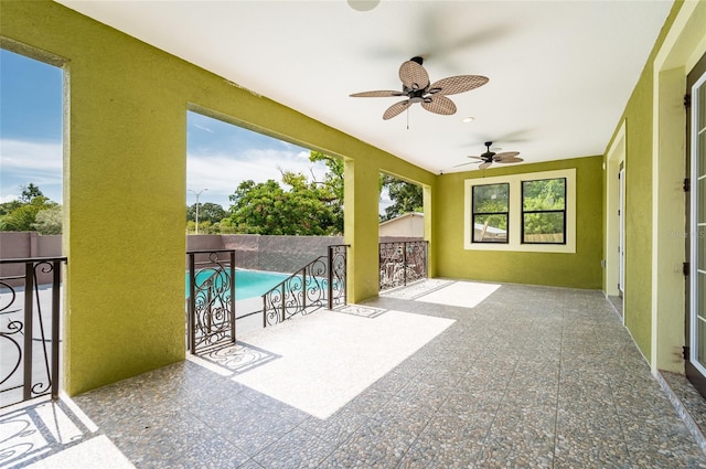 view of patio featuring ceiling fan