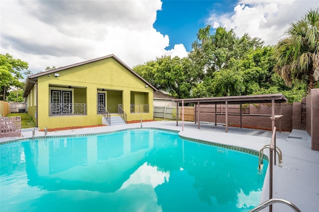 view of pool featuring a patio area