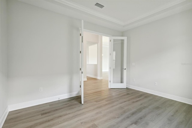 spare room with light wood-type flooring