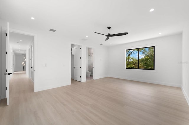 unfurnished bedroom with ceiling fan, connected bathroom, and light hardwood / wood-style flooring