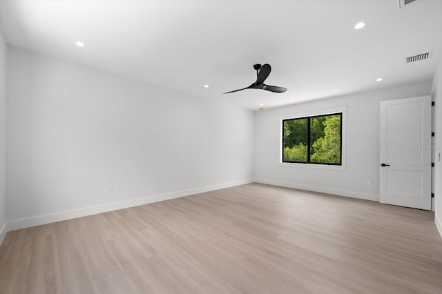 unfurnished room with light hardwood / wood-style flooring and ceiling fan