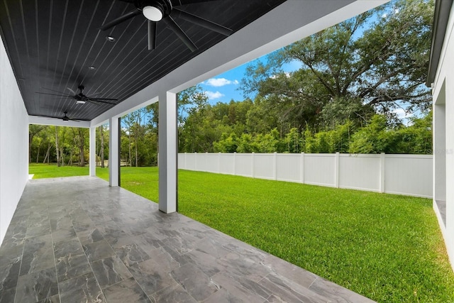 view of patio featuring ceiling fan