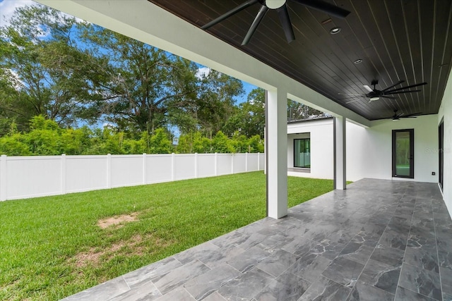 view of patio / terrace featuring ceiling fan