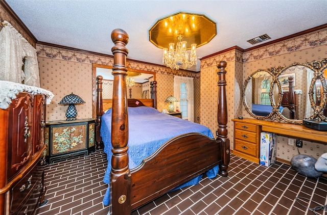 bedroom featuring ornamental molding, a chandelier, and a textured ceiling