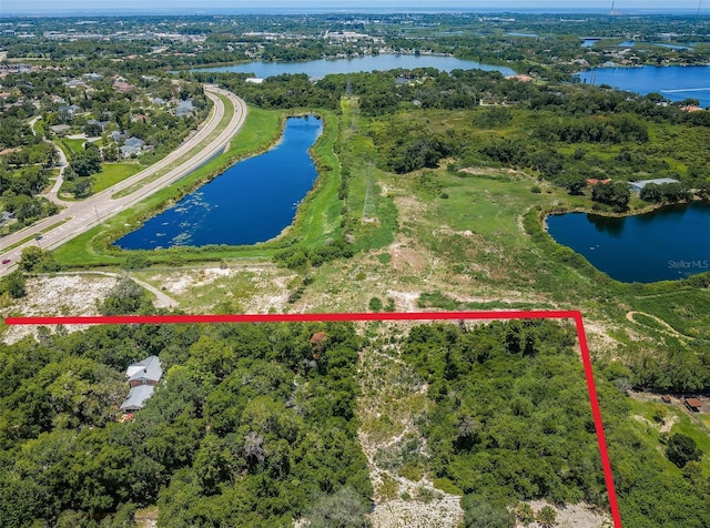 aerial view featuring a water view