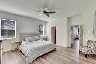 bedroom featuring hardwood / wood-style floors and ceiling fan