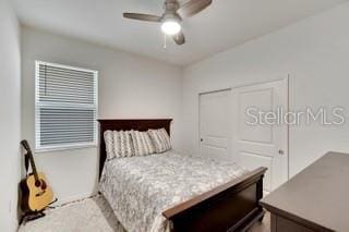 bedroom featuring ceiling fan