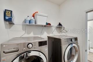 washroom featuring separate washer and dryer